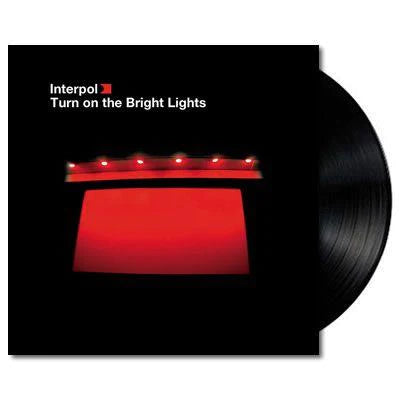 Interpol / Turn On The Bright Lights (Vinyl) - Merch Jungle - Official Interpol band t-shirts and band merch.